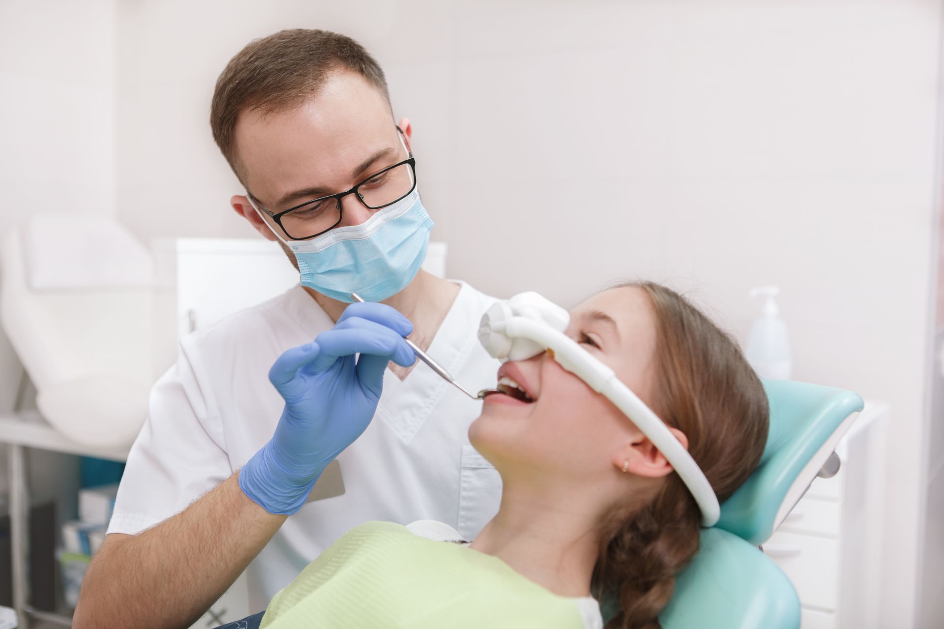 Woman at dentist office in chair