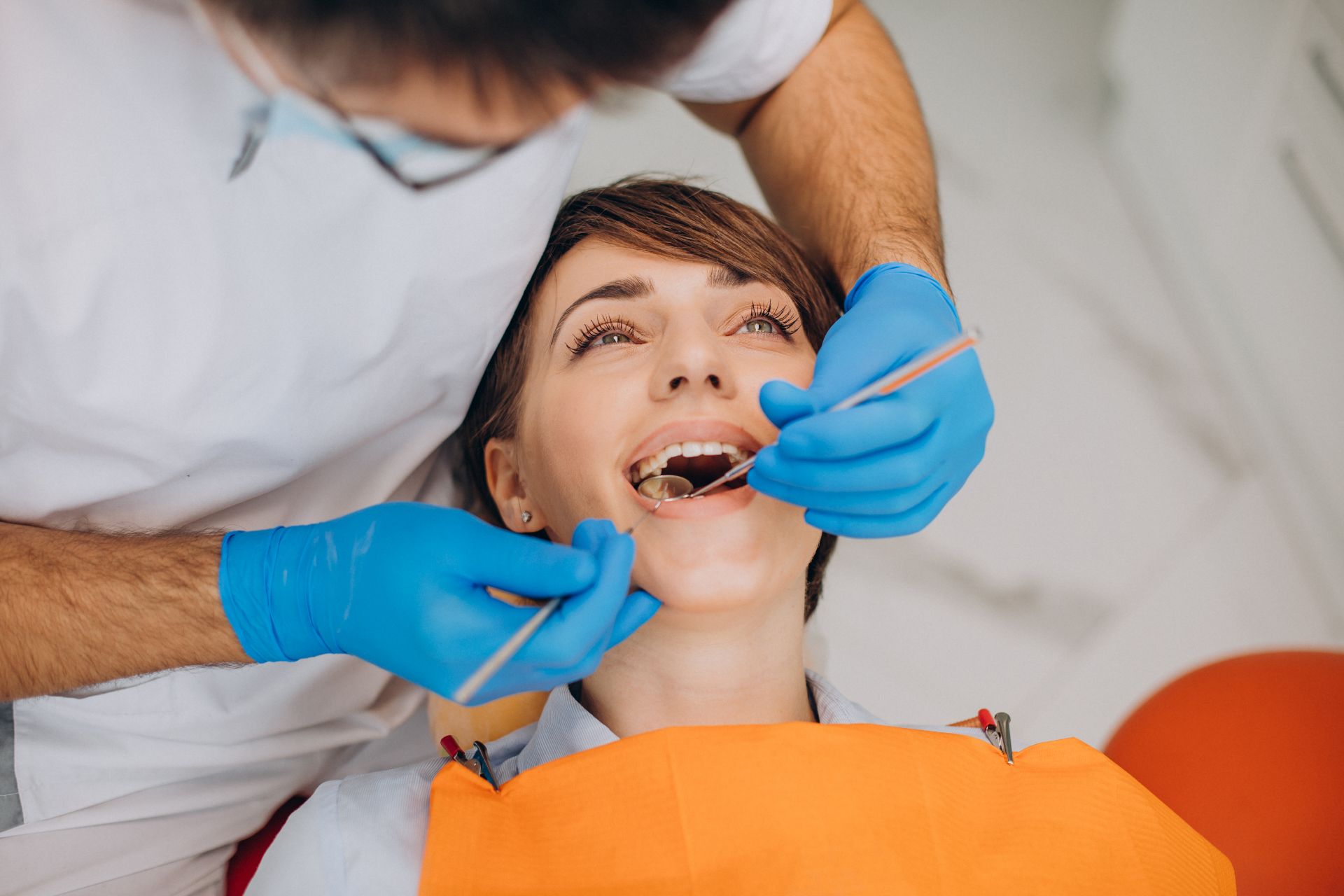 Woman having her teeth checked