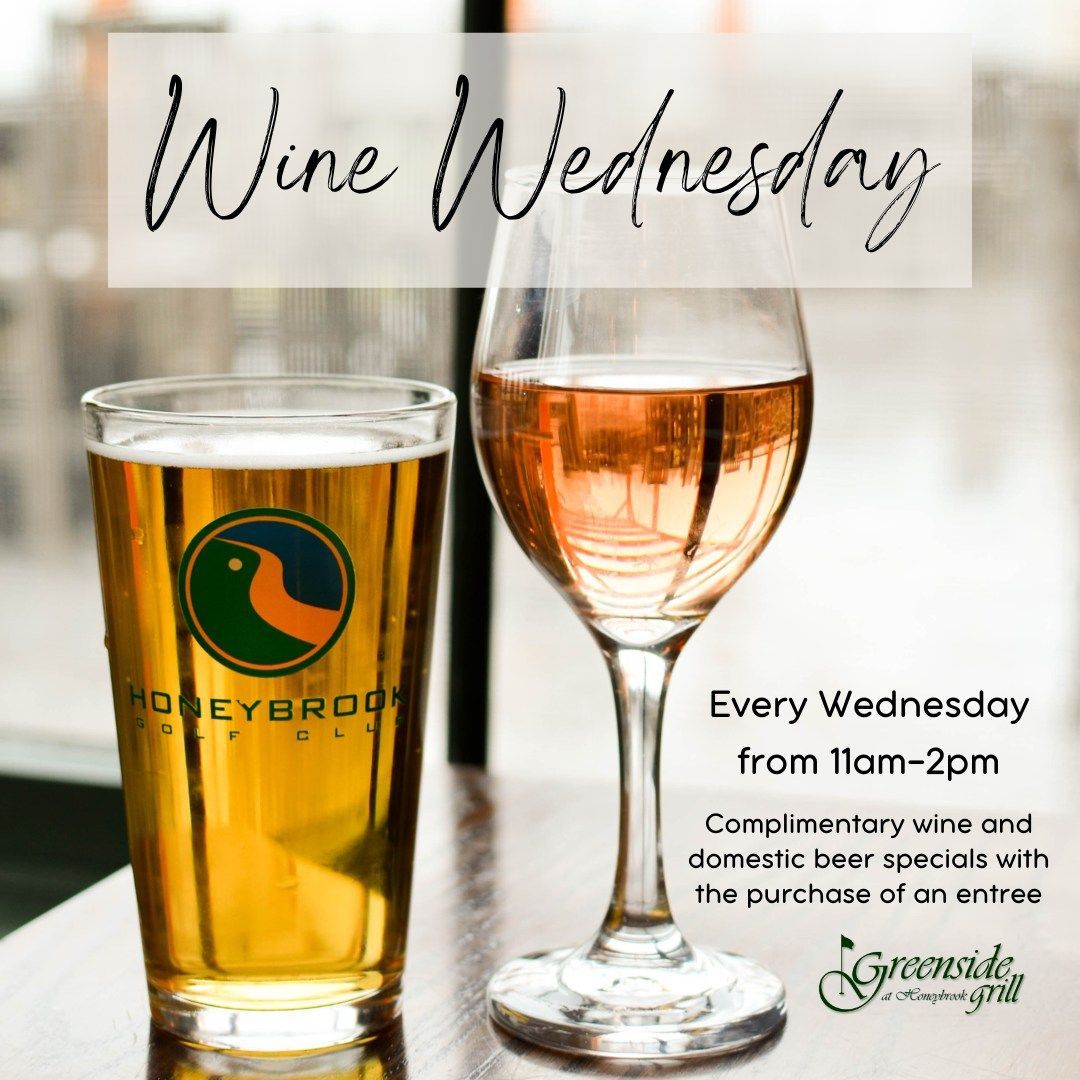 A glass of beer and a glass of wine on a table