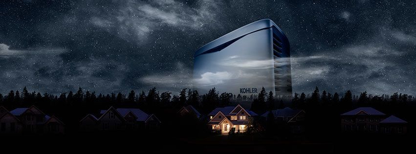 A house is lit up in front of a large building at night