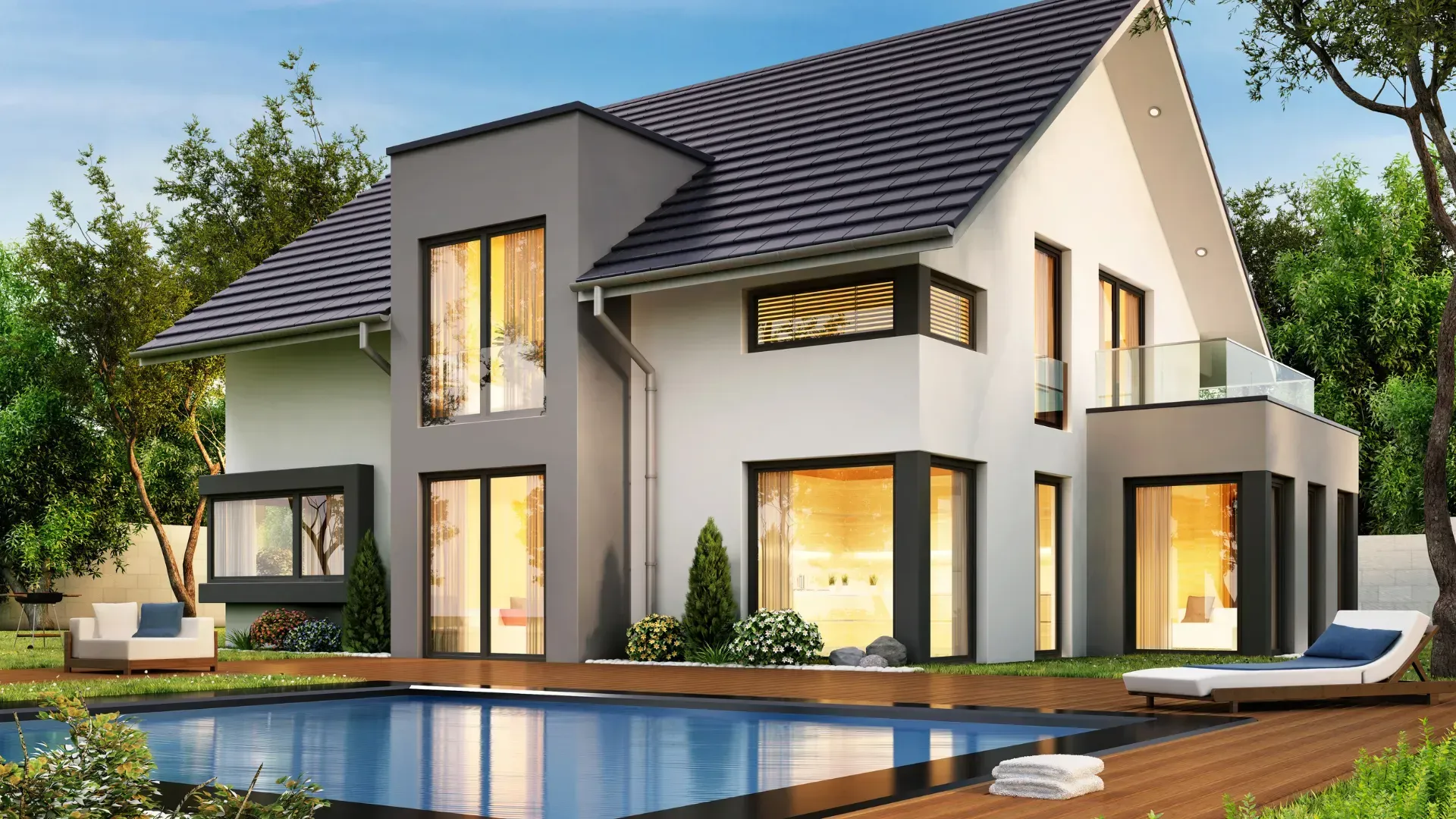 A large house with a swimming pool in front of it.
