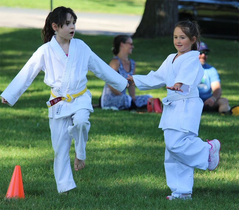 Two Kids Wearing Karate Uniform