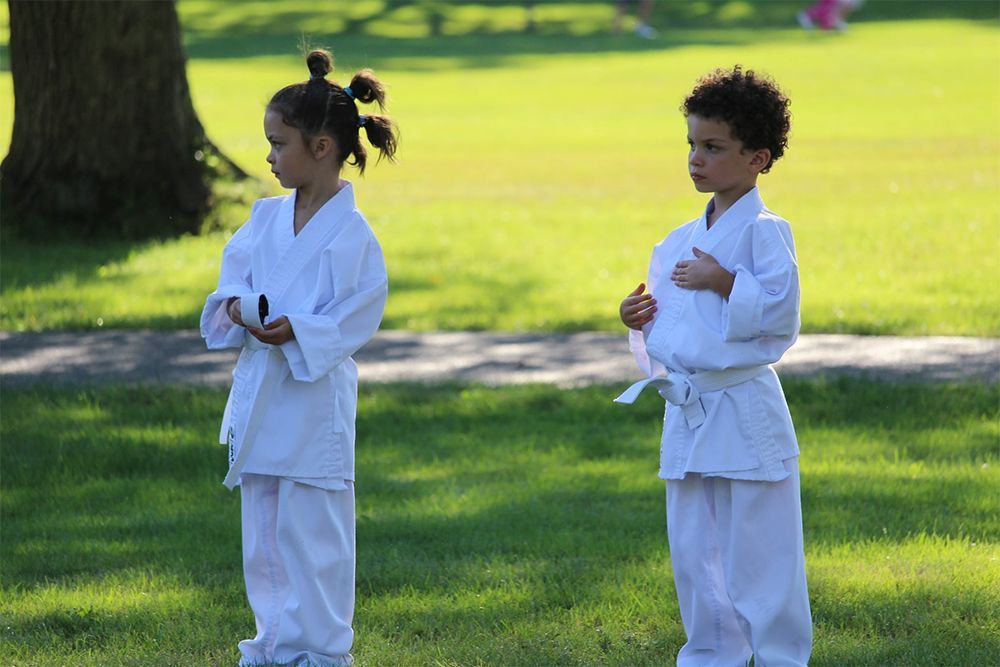 Two Kids Wearing Karate Uniform