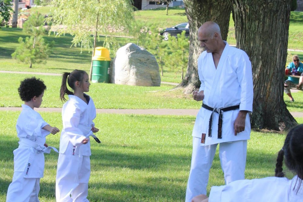 Trainer Teaching Two Kids