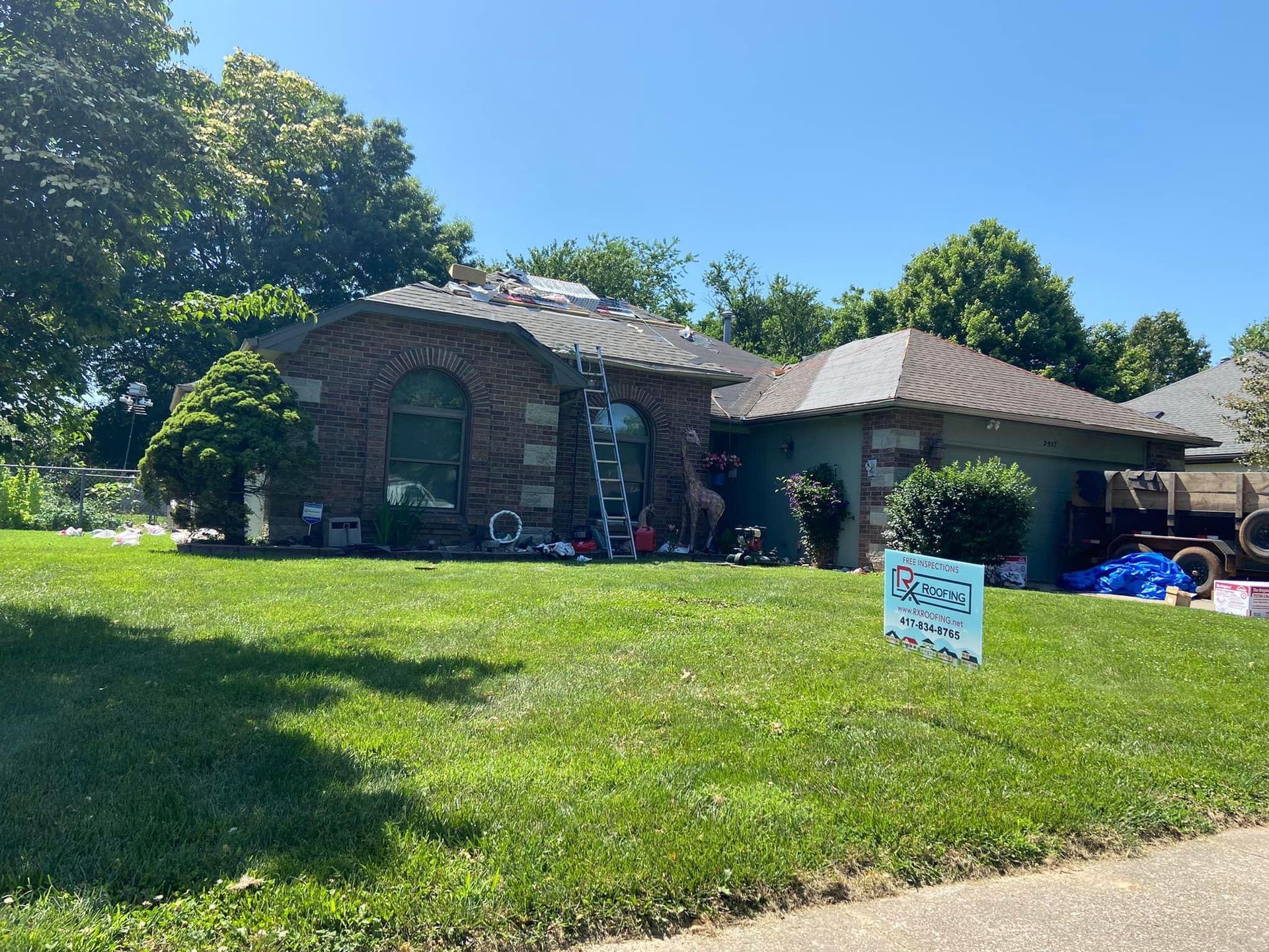 A house with a sign in front of it that says `` i love you ''.