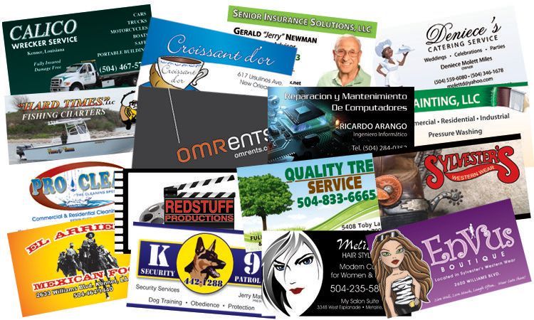 A bunch of business cards are stacked on top of each other