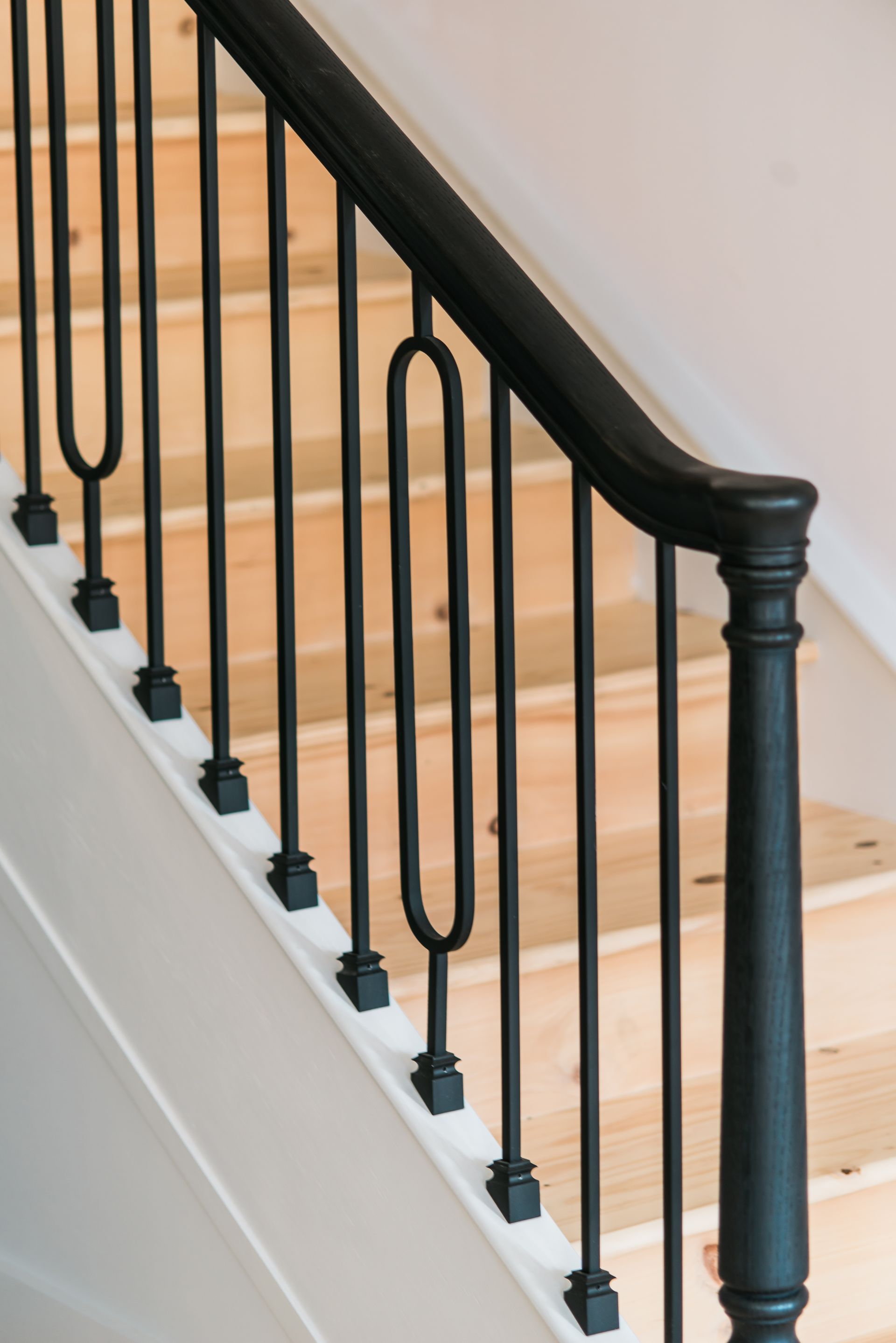 a black stair rail