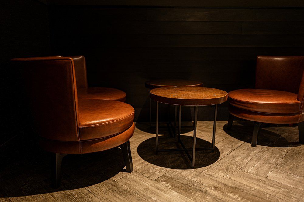 Chairs and Round Tables in The Corner — Atlanta, GA — Buckhead Plating