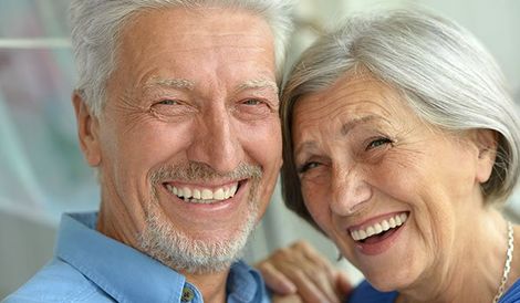 Smiling elderly couple