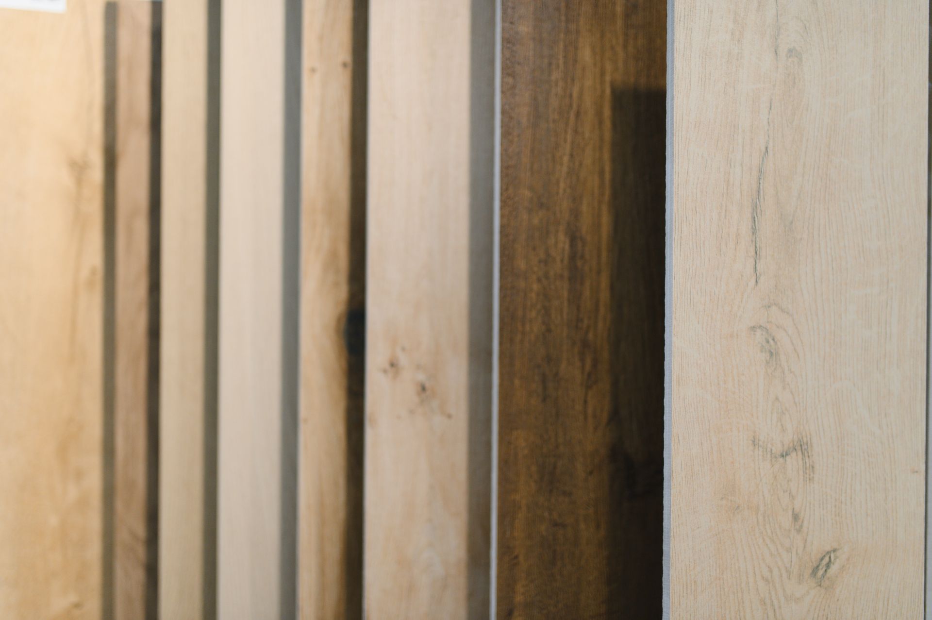 Wood flooring samples displaying various textures and tones.