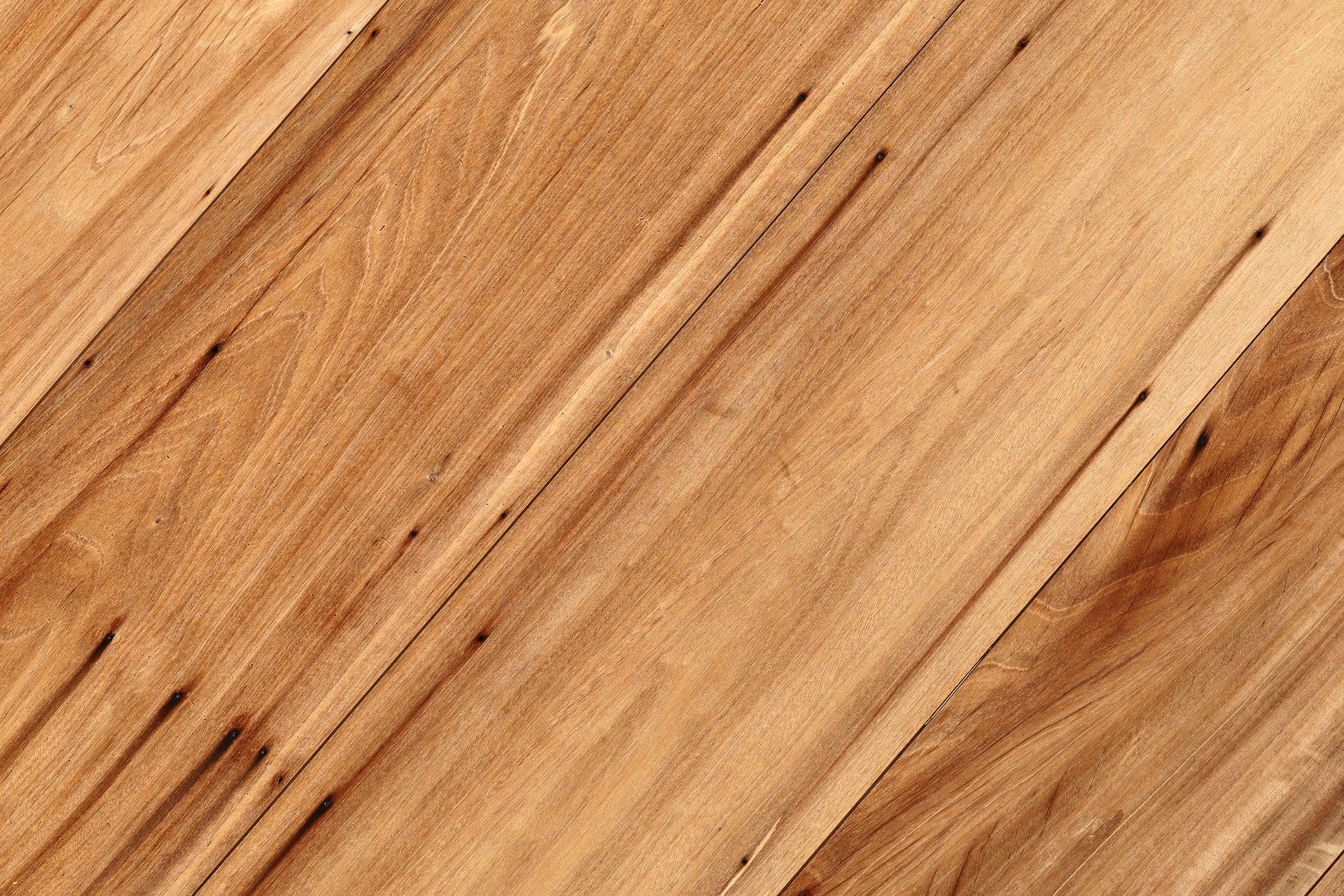 Close-up of a wooden surface with visible grain patterns and knots, Getty Images watermark. Close-up of a wooden surface with visible grain patterns and knots, Getty Images watermark.