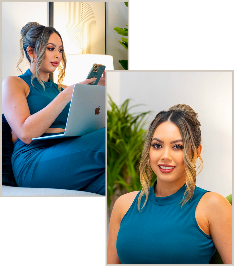 A woman in a blue dress is sitting on a couch with a laptop and a cell phone.