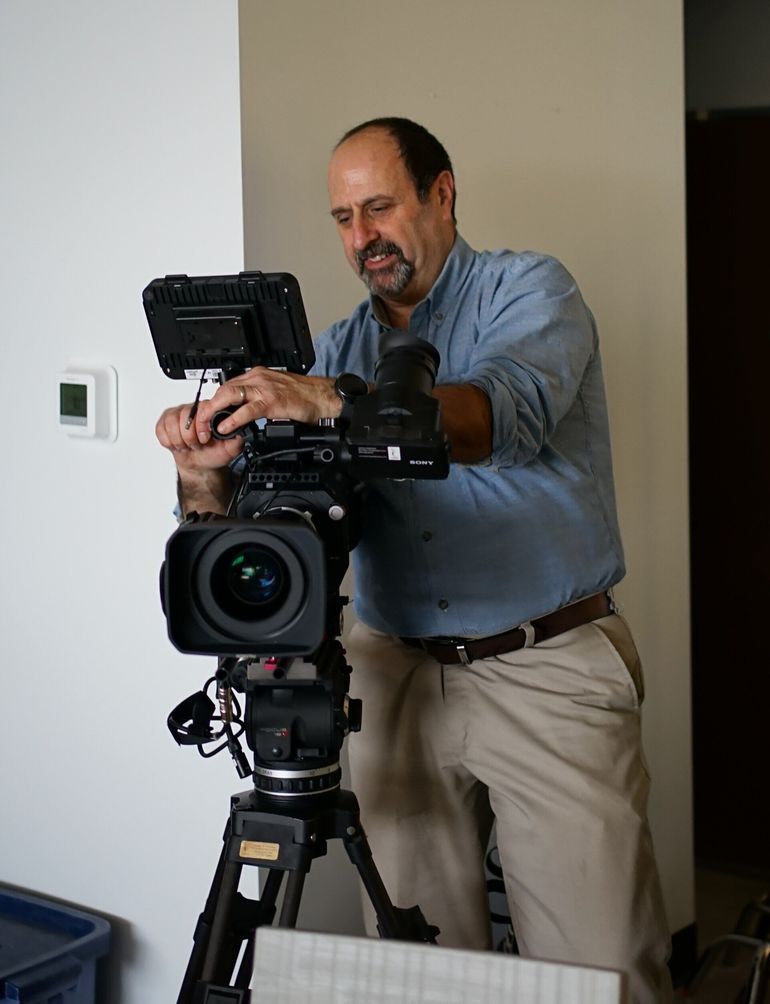 Jeremy Rothman operating his video cameras