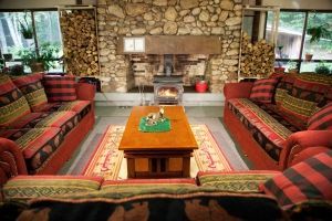 A living room filled with furniture and a fireplace