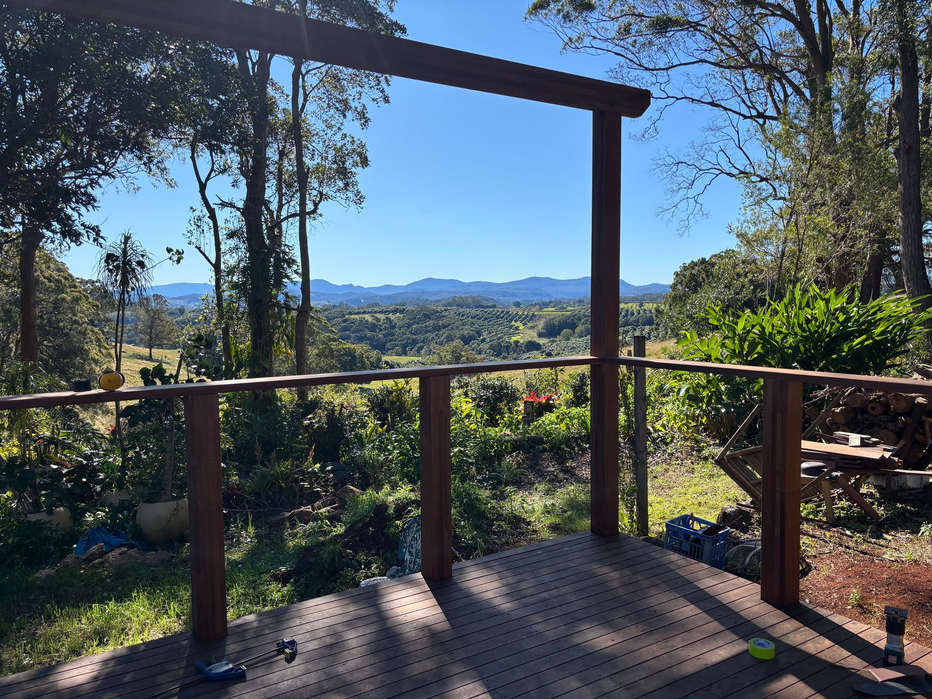A Large deck is overlooking a lot of land — Tim Williams Landscapes in Wollongbar, NSW