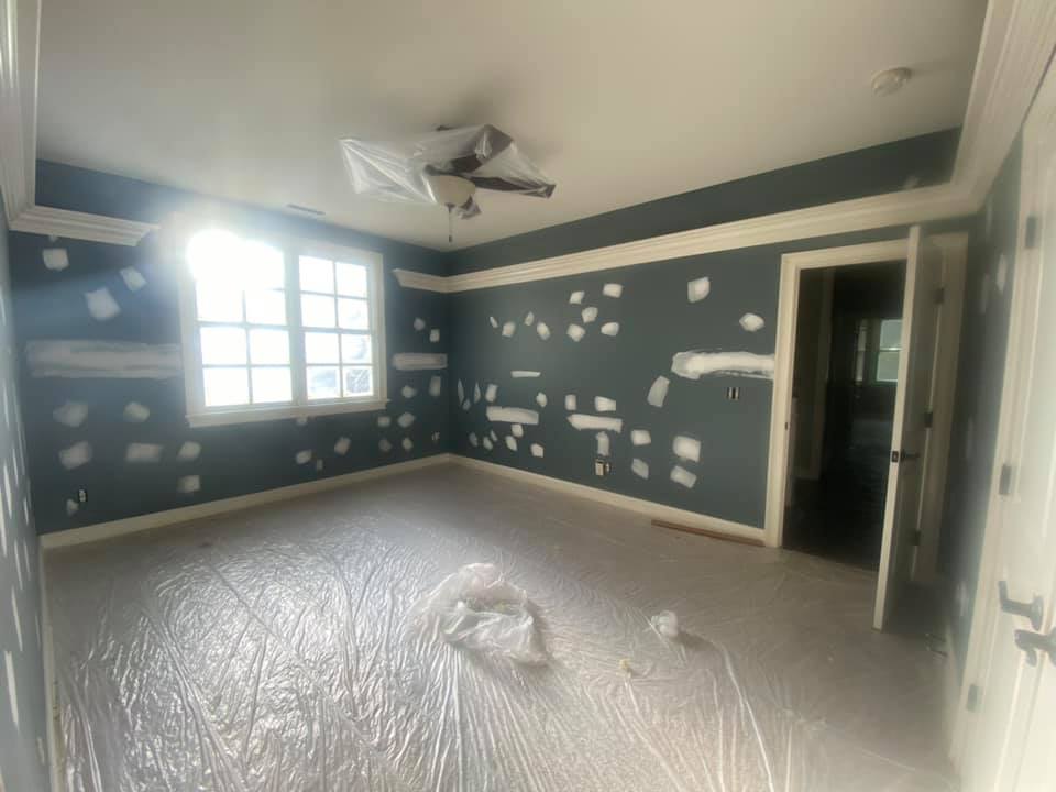 bedroom prepped for painting