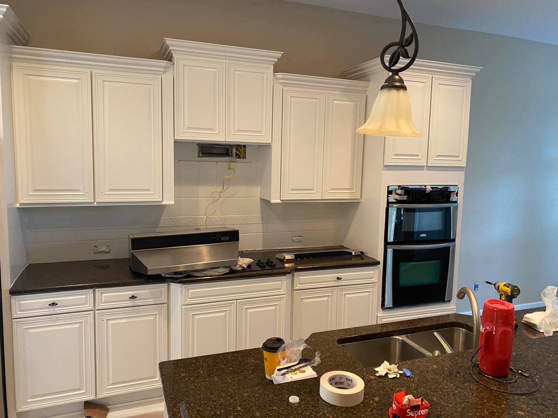 completed white kitchen cabinets