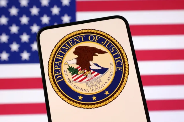 Graphic: US Department of Justice seal on a phone, american flag in background (Dado Ruvic)