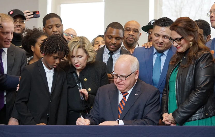 Minnesota Gov. Tim Walz signs Restore the Vote Act in 2023 (Photo: Alex Derosier/Forum News Service)