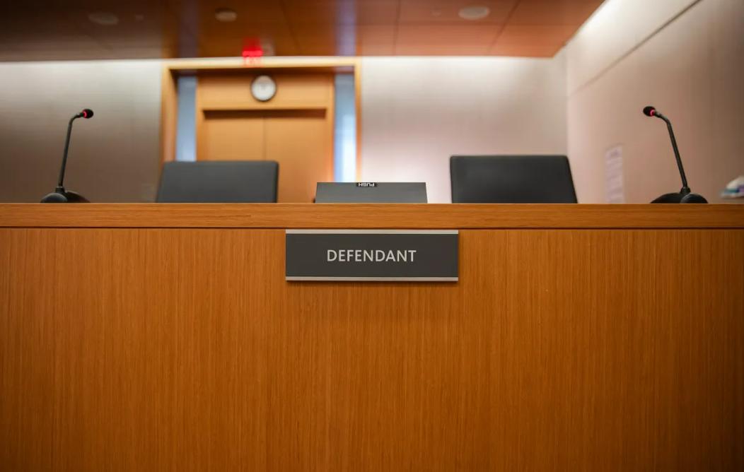 Defendant's seating in San Diego Courtroom (Photo: Adriana Heldiz/CalMatters)