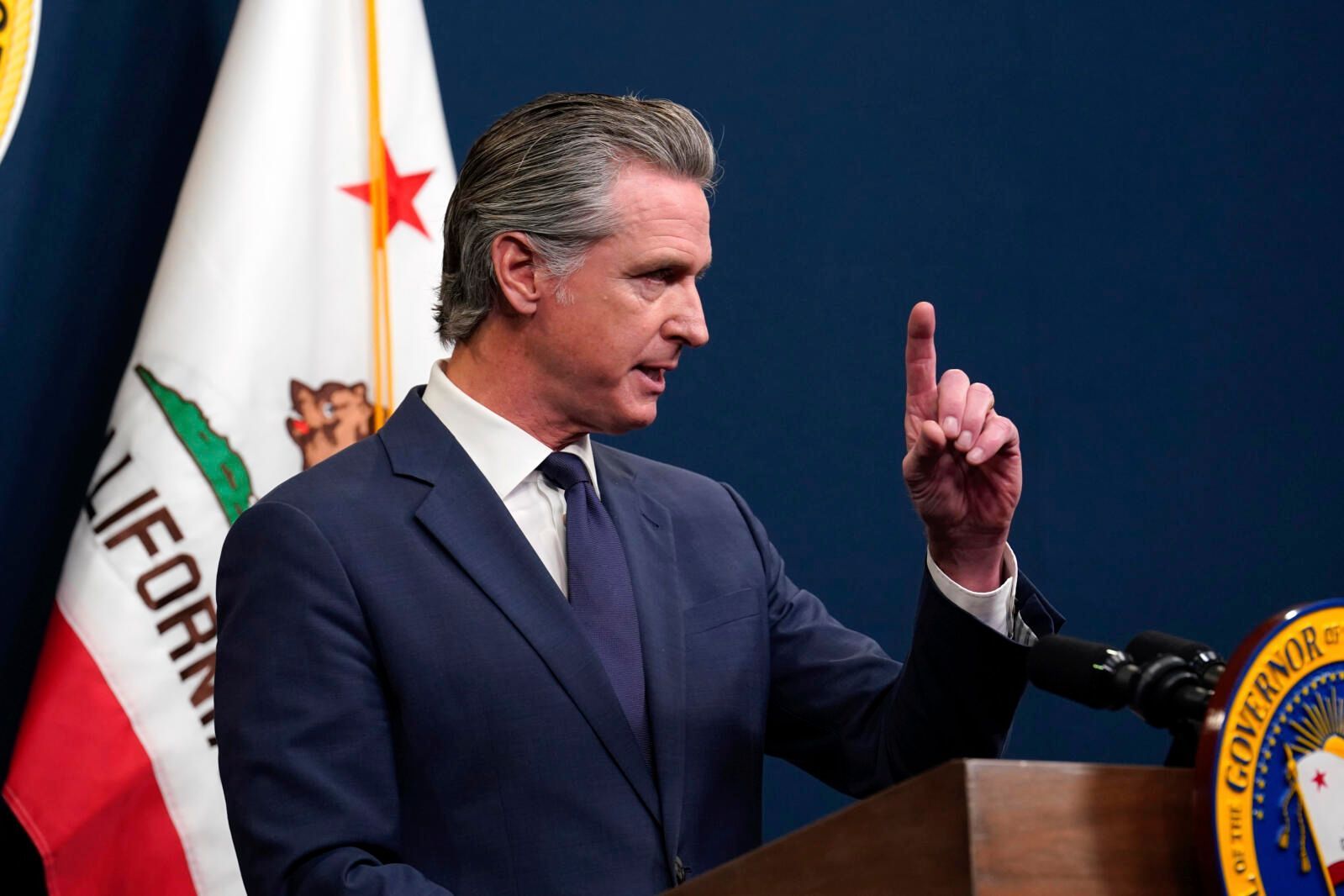 California Governor Gavin Newsom speaking at podium (Photo: Rich Pedroncelli /Associated Press)