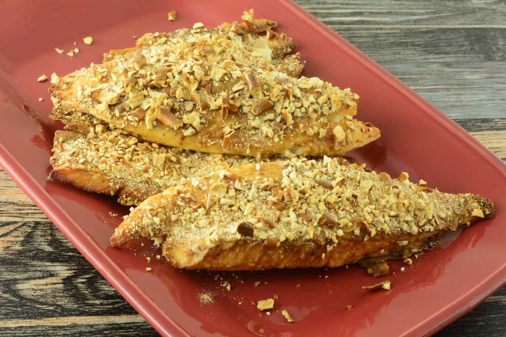 Baked tilapia fish fillets with pretzel bread crumbs