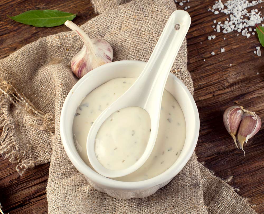 Bowl of Garlic sauce or mayonnaise