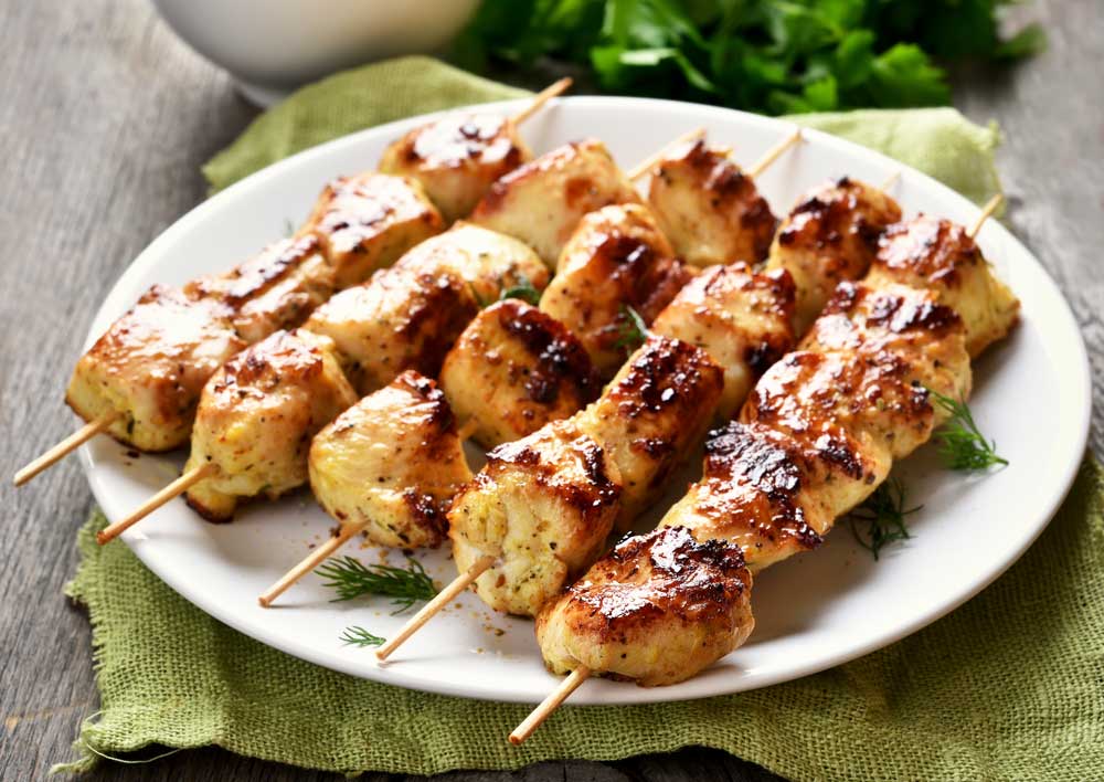 Grilled chicken on bamboo skewers