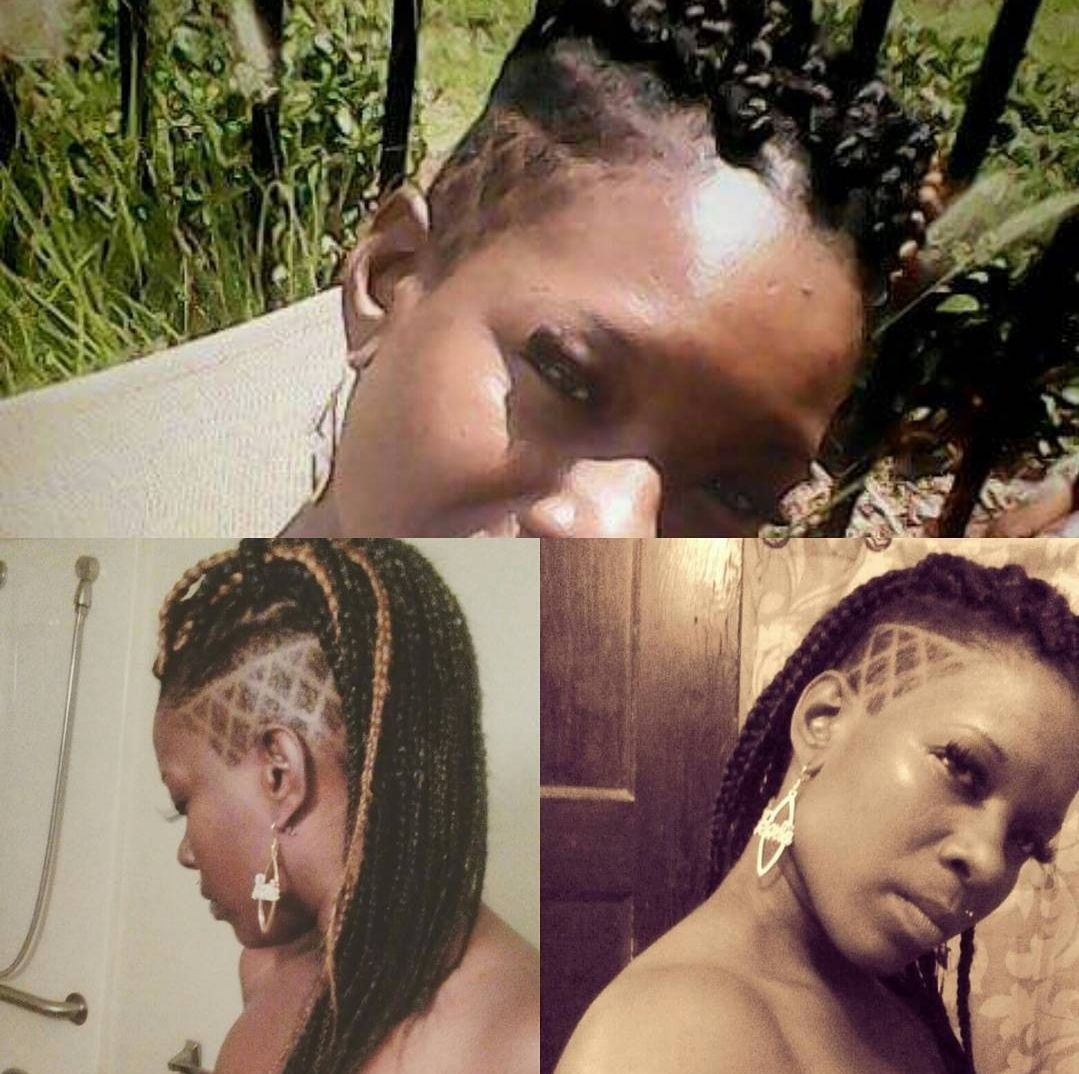 A woman with braids and a shaved head