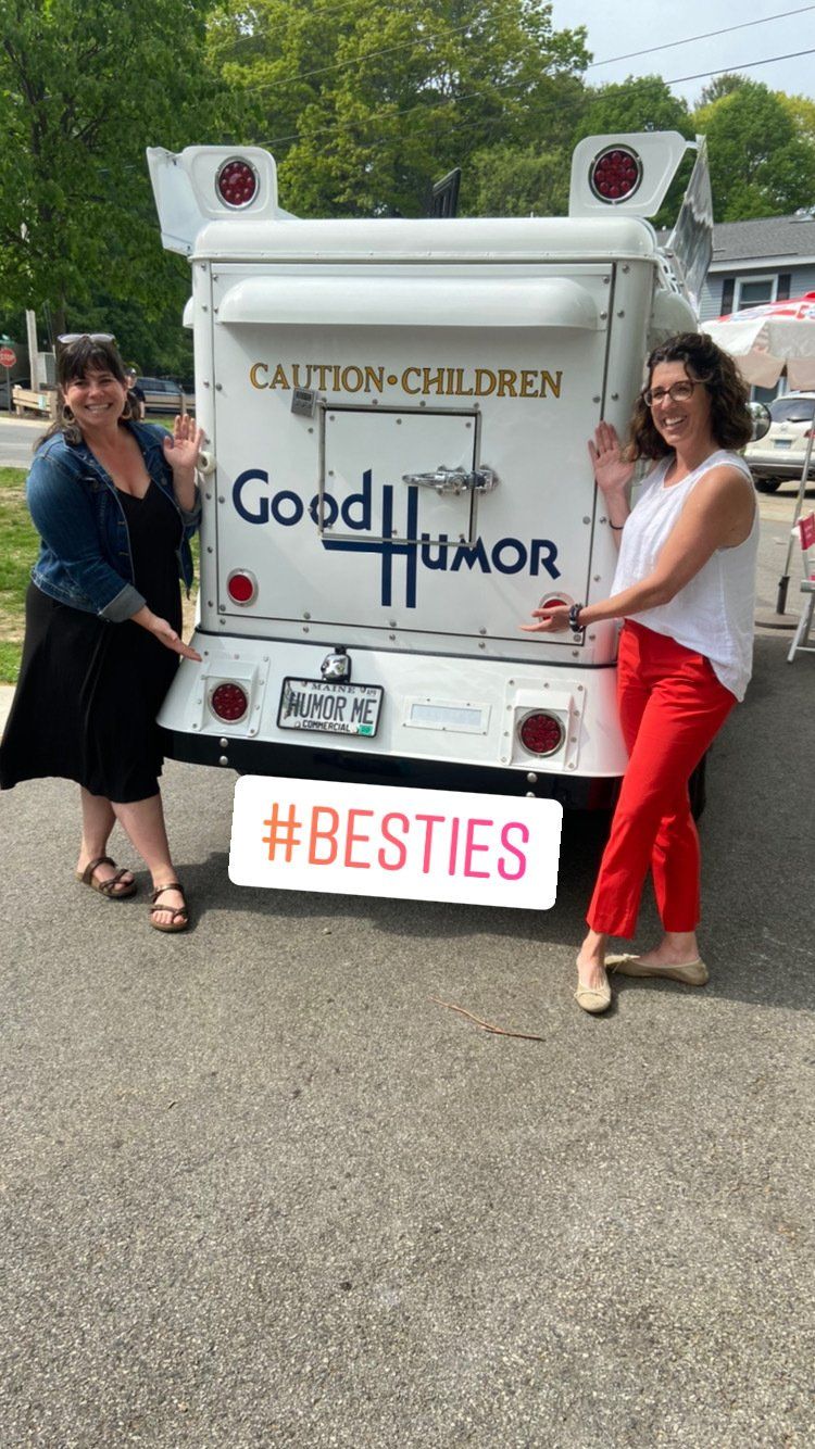 people standing by truck