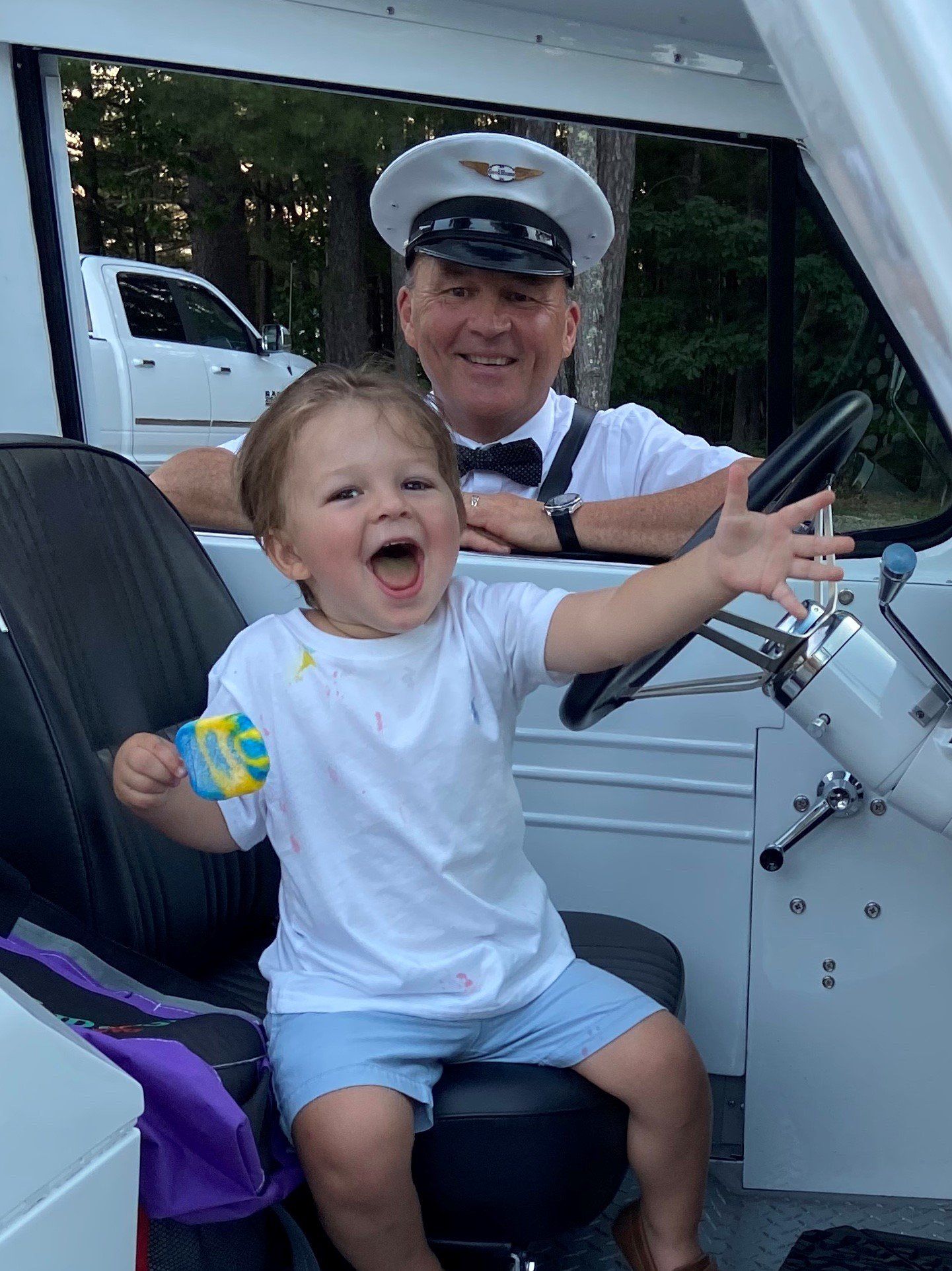 child sitting in ice cream truck