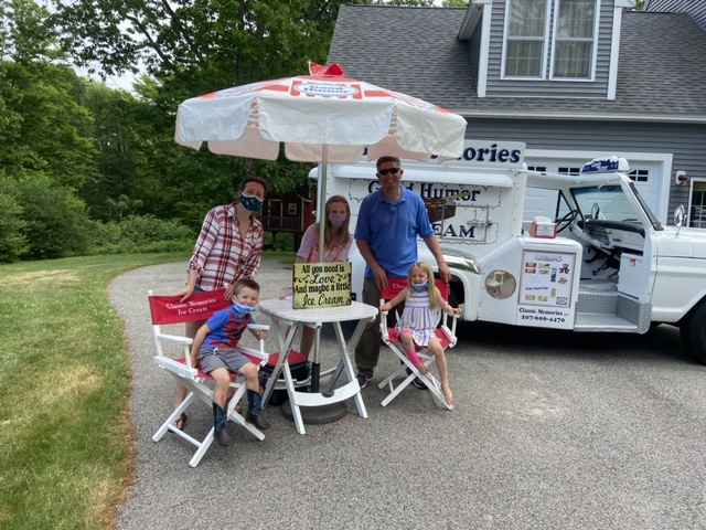 people sitting with at birthday party