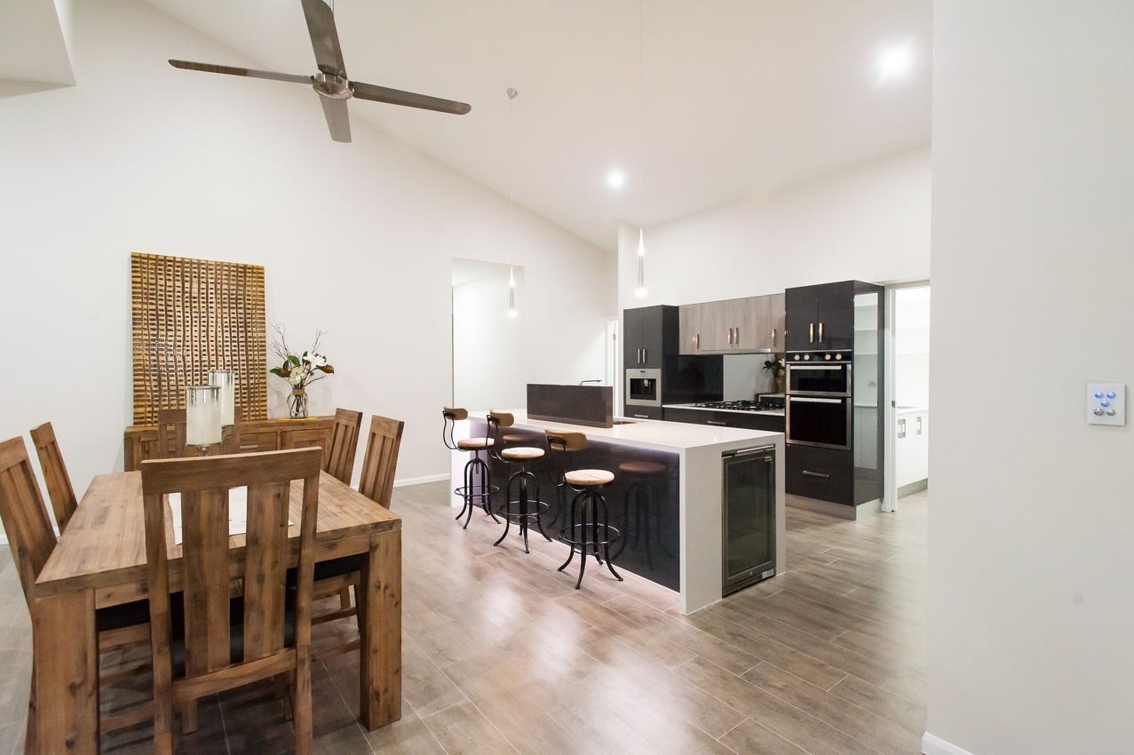 Kitchen with dining set — Cabinet-making in Mareeba, QLD