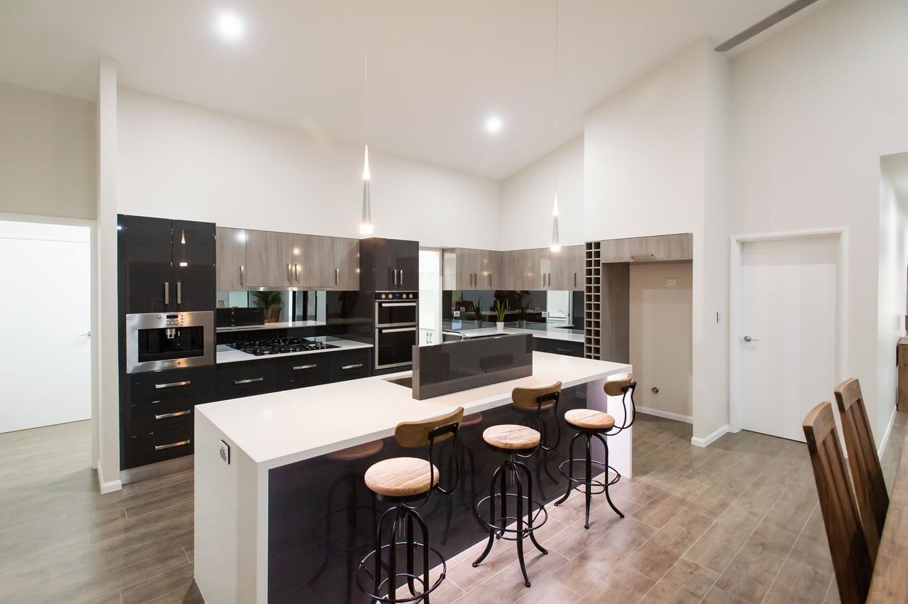 Kitchen island with round stools — Cabinet-making in Mareeba, QLD