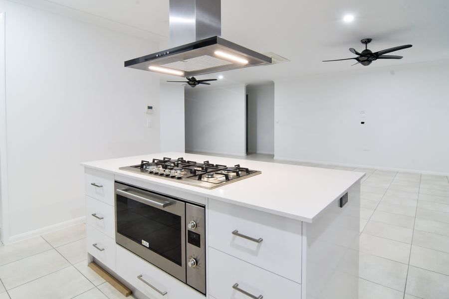 White Kitchen Island — Cabinet-making in Mareeba, QLD
