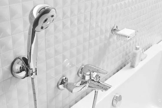 plumber connecting a pipe