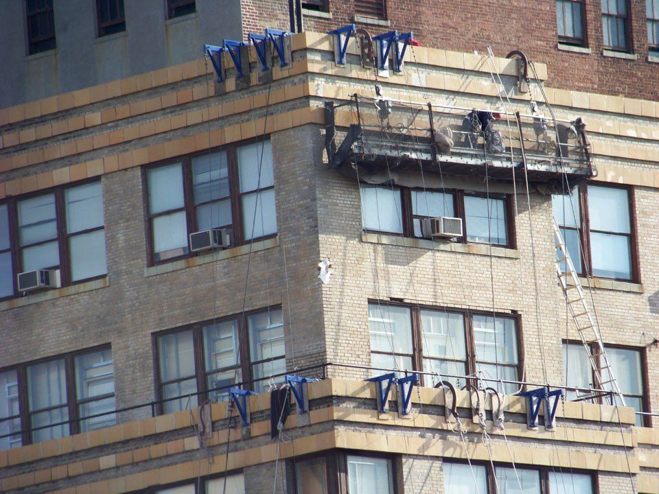 A building with a scaffolding on the side of it