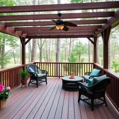 A wooden deck with rocking chairs and a table
