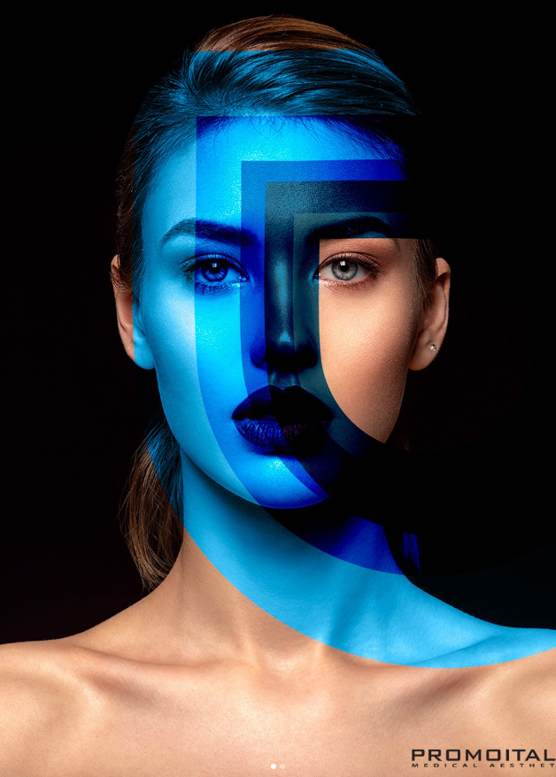 A woman with blue and black paint on her face.