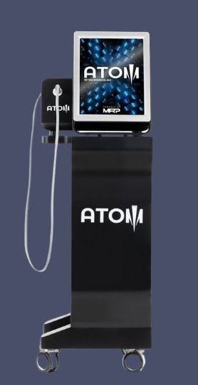 A black device with a screen that says atom on it