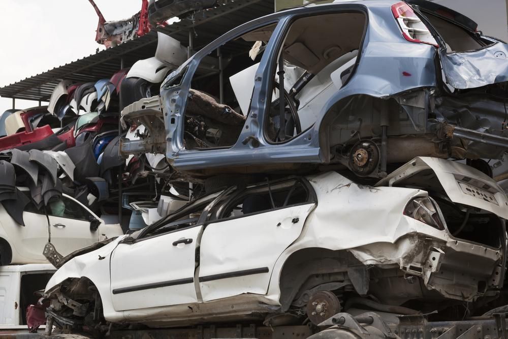 Cars Stacked in A Scrap Yard — Jap Performance T/A All Tuggerah City Auto Dismantlers in Umina Beach, NSW
