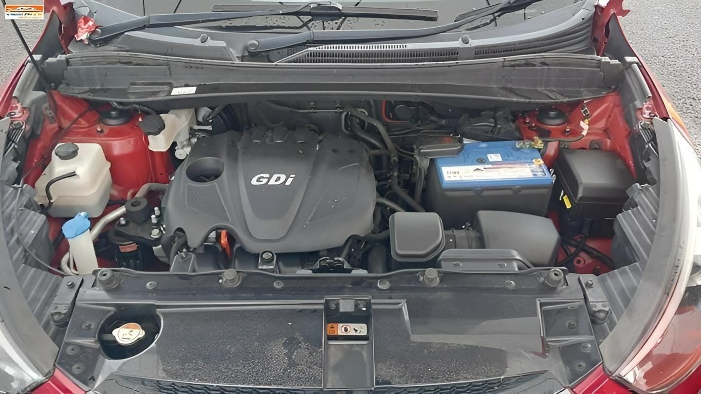 Red Car Engine Compartment with A GDI Engine — Jap Performance T/A All Tuggerah City Auto Dismantlers in Tuggerah, NSW