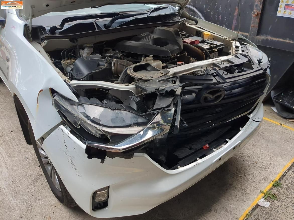 White Car with Significant Front-End Damage — Jap Performance T/A All Tuggerah City Auto Dismantlers in Woy Woy, NSW