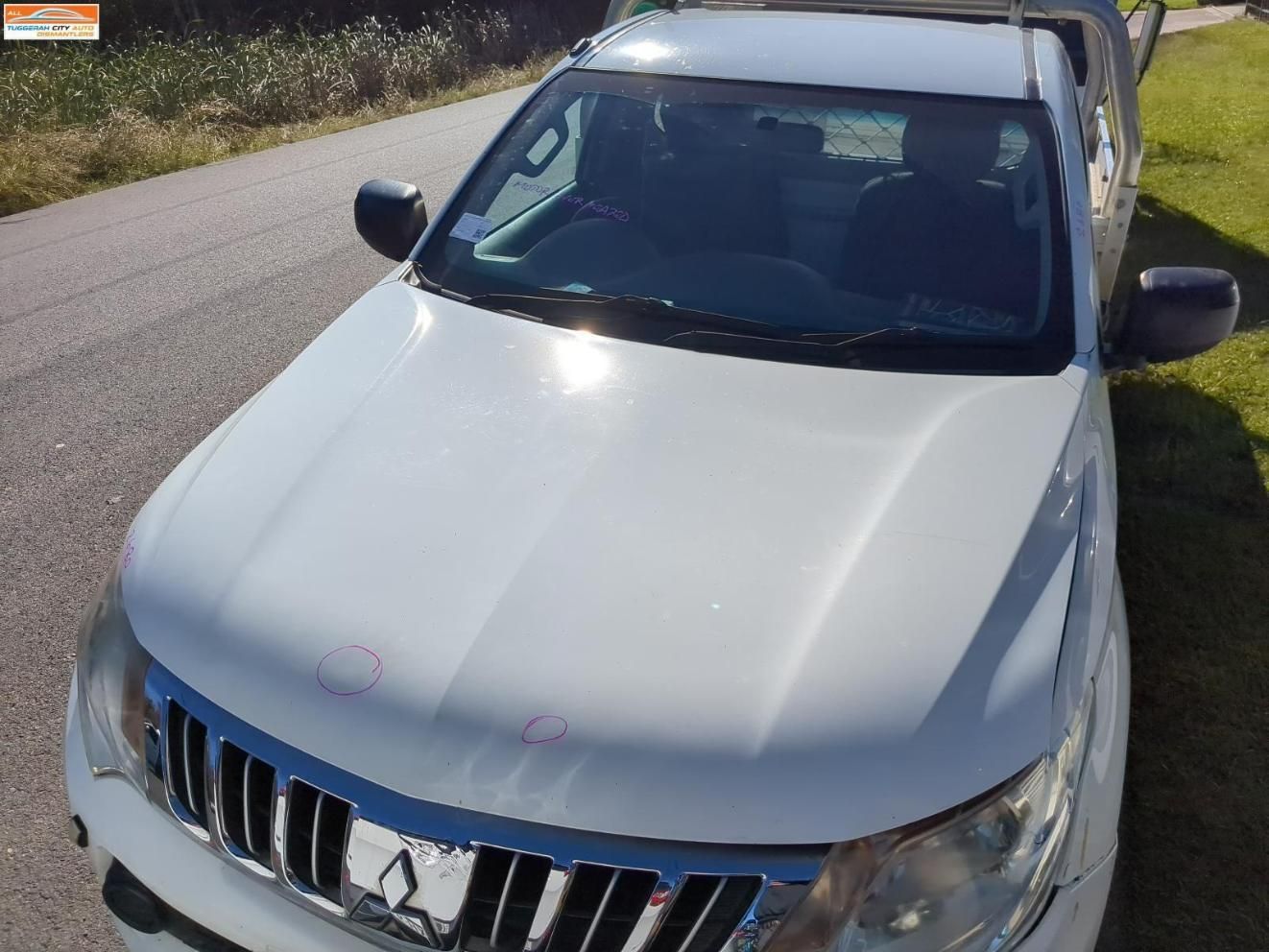 White Pickup Truck Parked on The Side of A Road — Jap Performance T/A All Tuggerah City Auto Dismantlers in Woy Woy, NSW
