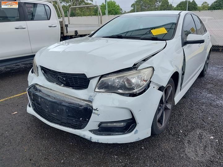 White Sedan with Front-End Collision Damage — Jap Performance T/A All Tuggerah City Auto Dismantlers in Wyong, NSW