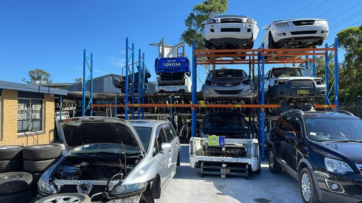 Salvage Yard with Cars Stacked on Shelves — Jap Performance T/A All Tuggerah City Auto Dismantlers in Tuggerah, NSW