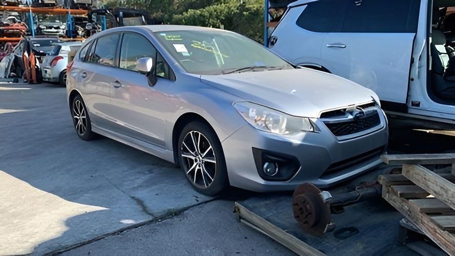 Silver Subaru Impreza Hatchback in A Junkyard — Jap Performance T/A All Tuggerah City Auto Dismantlers in Tuggerah, NSW