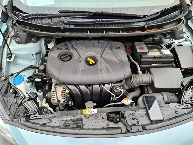 An Open Car Hood Reveals a Car Engine — Jap Performance T/A All Tuggerah City Auto Dismantlers in Tuggerah, NSW