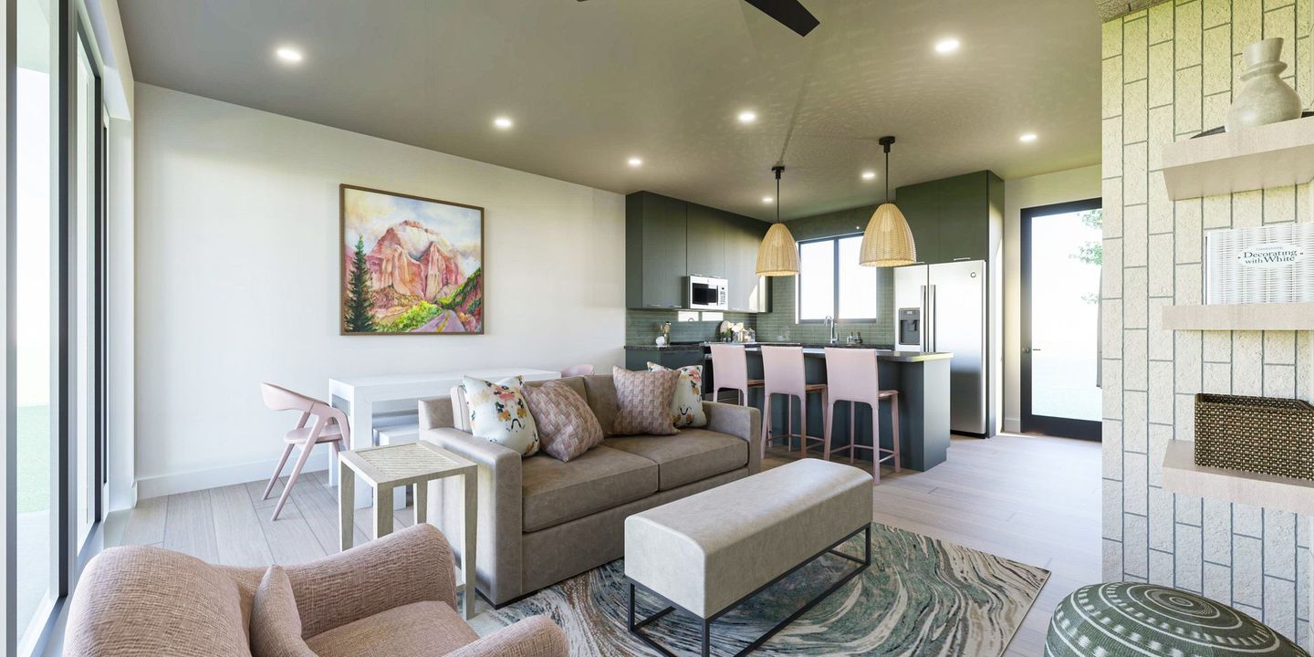 A living room with a couch , chairs , coffee table and a painting on the wall.