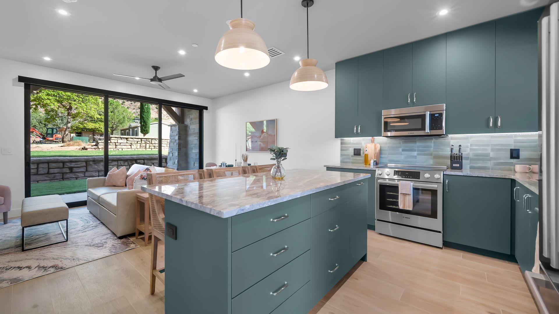 A kitchen with a large island in the middle of the room.